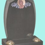 Intricate Black headstone with praying hands