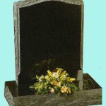 Ebony black granite with a hand pitched edge memorial