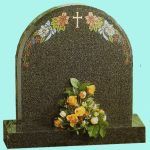 traditional headstone with coloured detail