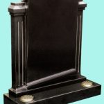 Ornate black granite scroll headstone