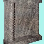 Ornate twisted cap and column headstone