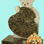 All polished Sapphire blue granite teddy bear clutching heart headstone