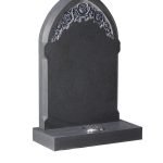 Traditional shape headstone with intricately carved roses