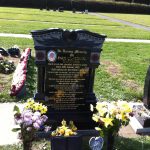 headstone with family photo