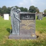 memorial with angel carving